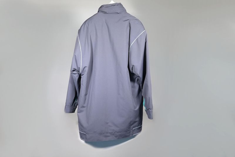Dienstkleidung, knielange Winterjacke (Herren) der Deutschen Bundespost mit schmalen Reflektorstreifen
