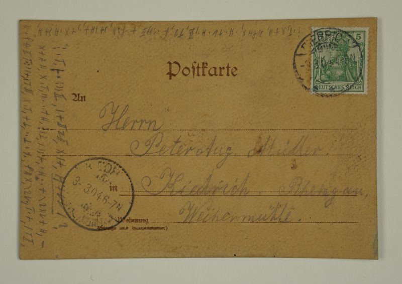 Postkarte mit Nachricht in verschlüsselter Schrift an Peter August Müller in Kiedrich