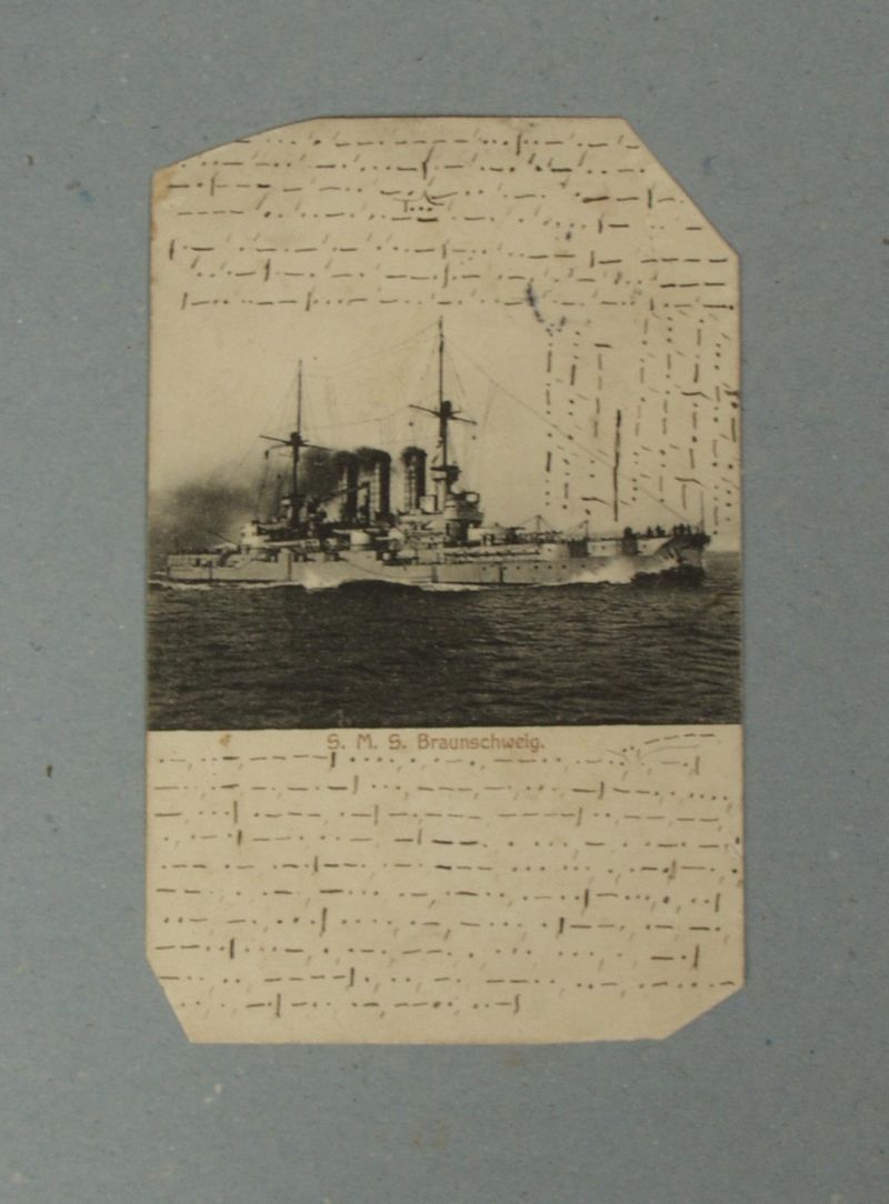chiffrierte Ansichtspostkarte der S.M.S. Braunschweig an M. Wunderlich in Delve mit Nachricht in Morsezeichen