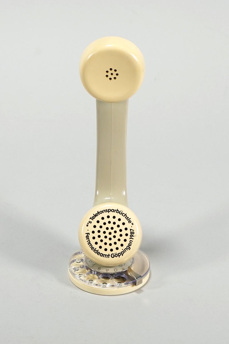 Spardose in Form eines Telefonhörers als s Telefonsparbüchsle des Fernmeldeamts Göppingen